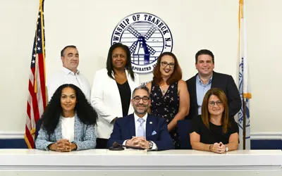 A group photo of the council members. The top row from left to right is Mark Schwartz, Denise Belcher, Hillary Goldberg, and Elie Y. Katz. The Bottom row is Danielle Gee, Michael Pagan, and Karen Orgen. 